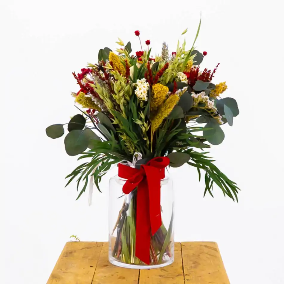 Jarrón flor seca en tonos rojos